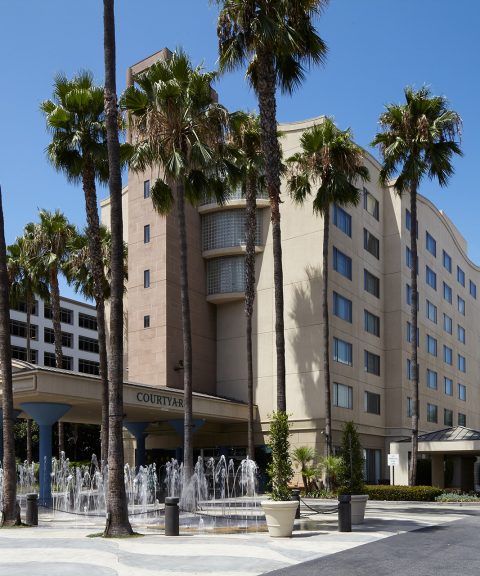 Courtyard by Marriott LAX/Century Boulevard exterior with fountains