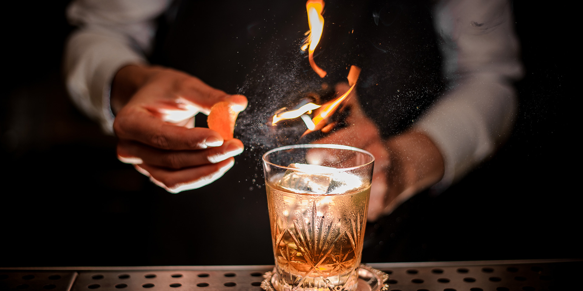 Beverage old fashioned with smoke and orange peel